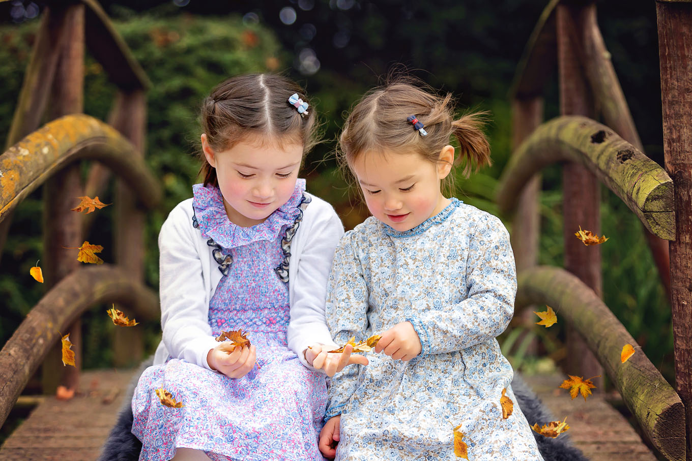 Autumnal outdoor portrait of little girls
